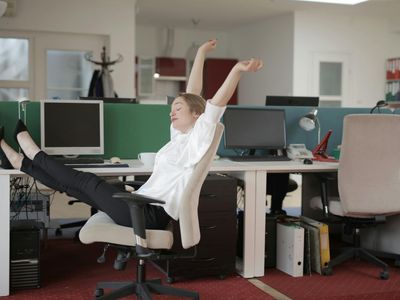 Office employee doing a quick stretch break